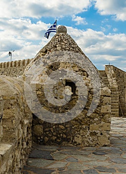 HERAKLION, GREECE - November, 2017: Watchtower with loopholes and fortress wall of old Venetian Fortress Koule in Heraklion, Crete