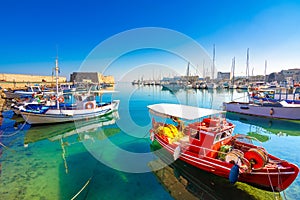 Heraklion harbour with old venetian fort Koule and shipyards, Crete.