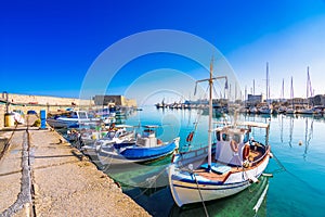 Heraklion harbour with old venetian fort Koule and shipyards, Crete. photo