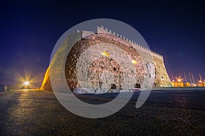 Heraklion harbour with old venetian fort Koule and shipyards, Crete photo