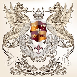 Heraldic design with dragons, fleur de lis and shield photo