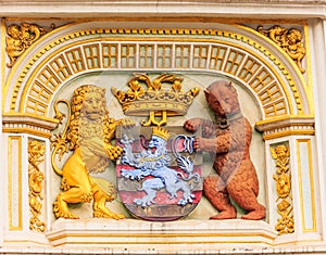 Heraldic lion and bear, town hall Coat of arms , the city arm of Bruges, Belgium, Europe