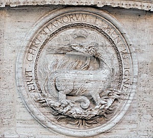 Heraldic salamanders on the facade of Church of St Louis of the French, Rome