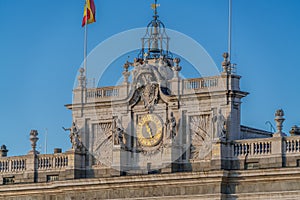 Heraldic shield, clock and bells detail of Royal Palace Palacio Real of Madrid, Spain