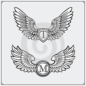 Heraldic wings set. Design elements. Vector illustration.