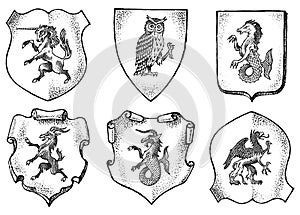 Heraldry in vintage style. Engraved coat of arms with animals, birds, mythical creatures, fish. Medieval Emblems and the