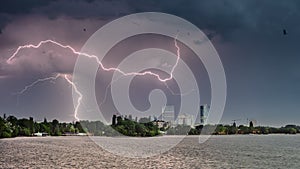 Herastrau park in Bucharest on a stormy day with lightning