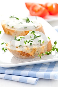 Herb cheese on baguette