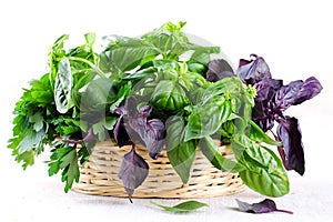 Herb leaf selection in a rustic wooden basket