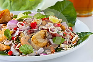 Herb salad with deep fried fish and shrimp (Thai f