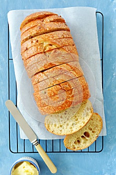 Herb seed bread on blue background