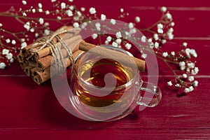 Tea in a transparent cup on the table