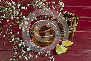 Tea in a transparent cup on the table