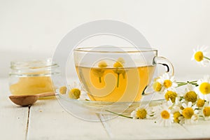 Herbal chamomile tea isolated on white background
