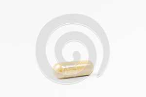 Herbal Drug an alternative medicine in capsule on white background