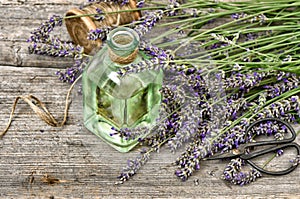 Herbal lavender oil with flowers. Alternative medicine