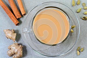 Herbal masala tea in a glass cup