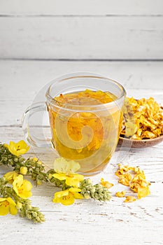 Herbal medicinal tea drink made of Verbascum thapsus, the great mullein, greater mullein or common mullein.