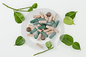 Herbal medicine in capsules with kaffir lime leaf