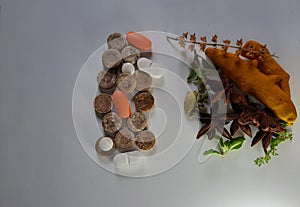 Herbal medicine VS brown Chemical pills isolated medicine the alternative healthy car .Leaf ,medical on white background