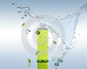 The herbal moisturizing shampoo stands on the water background with splash and mint leaves