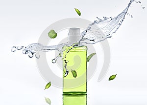 The herbal moisturizing shampoo stands on the white background with water splash and mint leaves