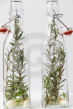 Herbal oil with sage, rosemary and garlic