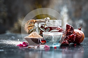 Herbal and organic face pack of pomegrante with some raw pomegranate juice and fuller`s earth or mulpani mitti,and rose water on w