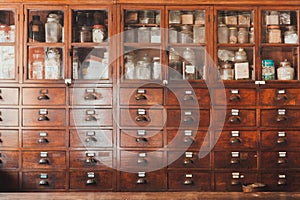 Herbal shop or Chinese herb store dried wooden antique cupboard