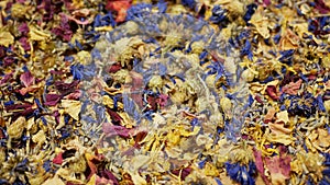 Herbal tea dried blend mixture of rose, cornflower, hibiscus, thyme leaf petals and mother-of-tea for high-quality teas