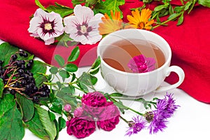 Herbal tea of fresh rose, dog-rose, cornflowers, mallows and calendula flowers