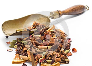 Herbal tea with leaves, fruits and herb