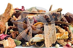 Herbal tea with leaves, fruits and herb