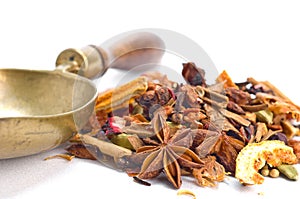 Herbal tea with leaves, fruits and herb