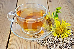 Herbal tea from root of elecampane with flower