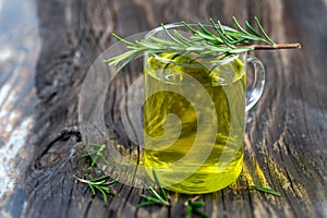 Herbal tea.Rosemary infusion in a glass cup.Rosmarinus officinalis.Naturopathy.