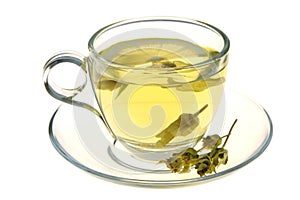 Herbal tea, sage leaves and lemon slice isolated on white background