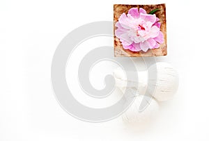 Herbal Thai massage balls and flower in a bowl with water. Spa concept.