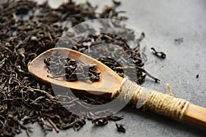 Herbal wellness dry tea in spoon