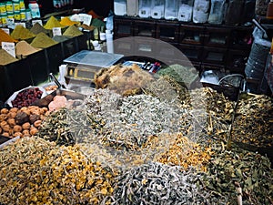 Herbals, tea  and spices at food market stall Suq Al Hamidiyah in Damascus photo