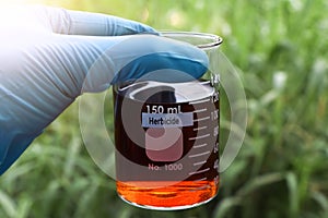 Herbicide in glass, Herbicides are used to manage wasteland or control weeds in agriculture