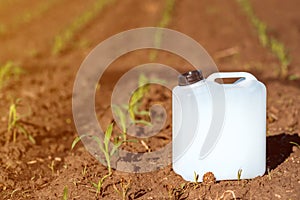 Herbicide plastic canister can in corn field