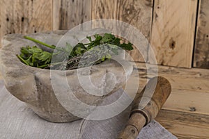 Herbs and pestle and mortar