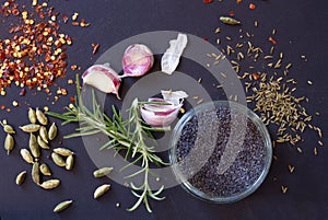 Herbs and spices, garlic cloves with rosemary photo