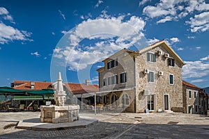 Herceg Novi old town square with drinkable water photo