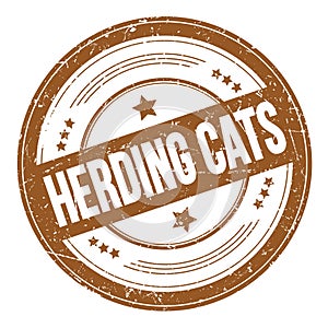 HERDING CATS text on brown round grungy stamp