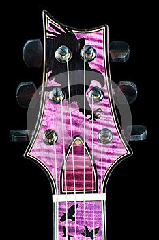 Highly Figured Purple Burst Electric Guitar Headstock - Flamed Maple Ebony Eagle Straight on photo