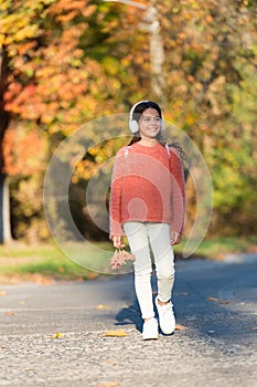 Here I go. Little child travel in autumn forest. Little child enjoy autumn holidays. The best education is through