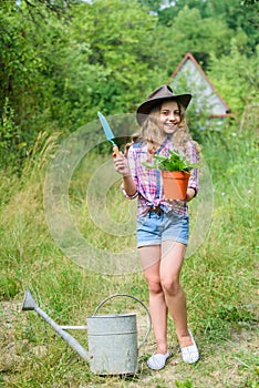 Here i am. hellow summer. small girl planting with shovel. earth day. environment ecology. green nature protection