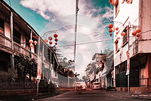 Heritage building in Indonesia, motion blur of car.